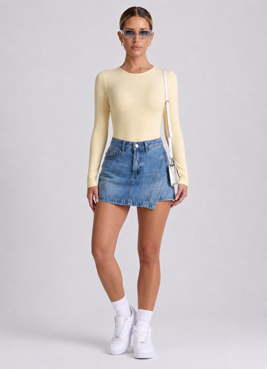 Body Manga Larga Color Amarillo y Sesgo Rosado