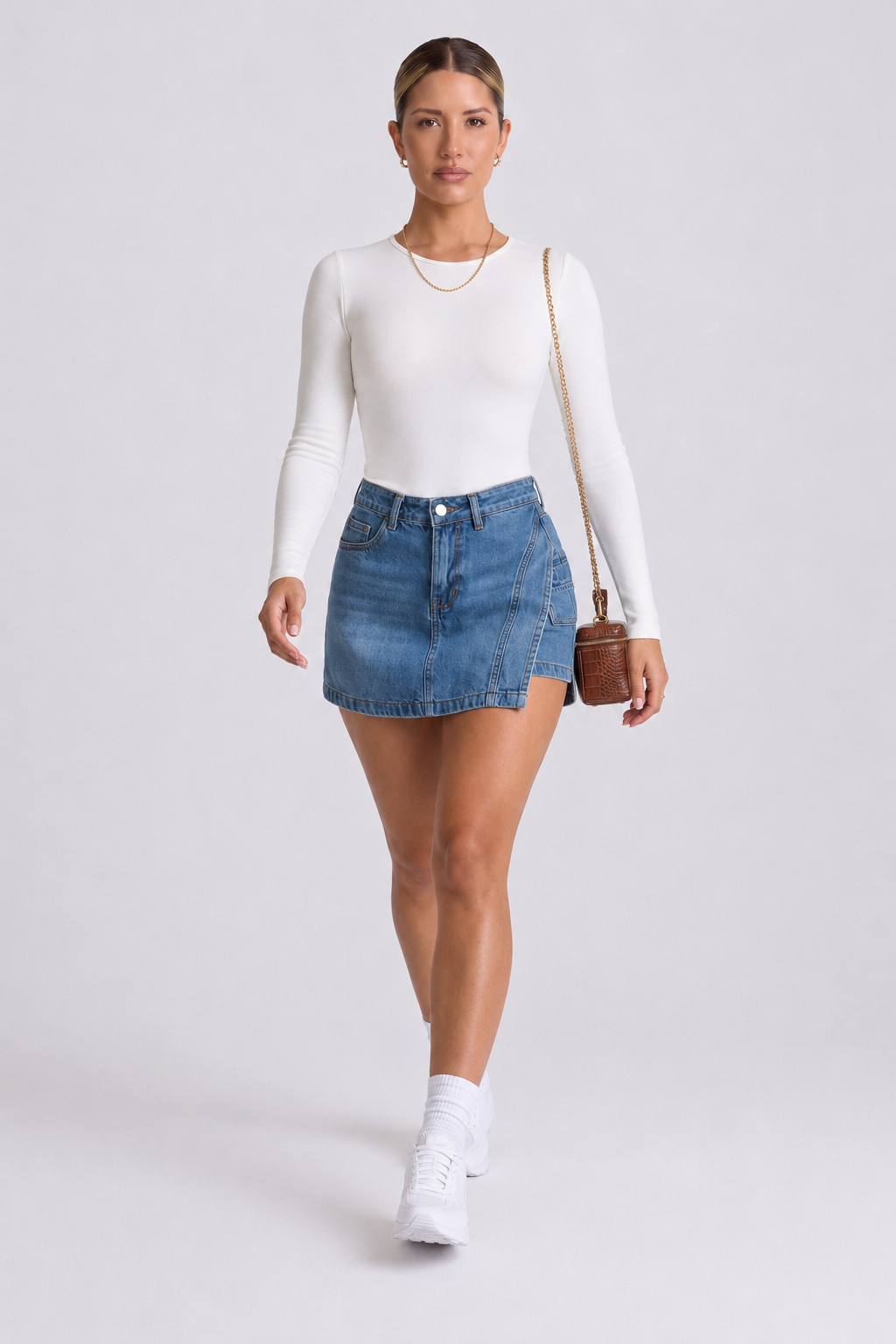 Body Manga Larga Color Blanco y Sesgo Rosado