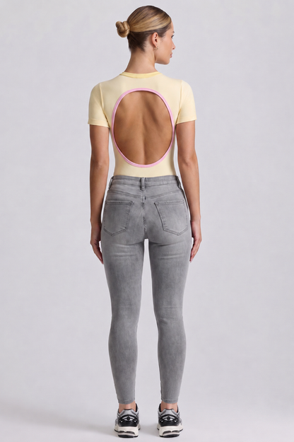 Body Manga Corta Color Amarillo y Sesgo Rosado