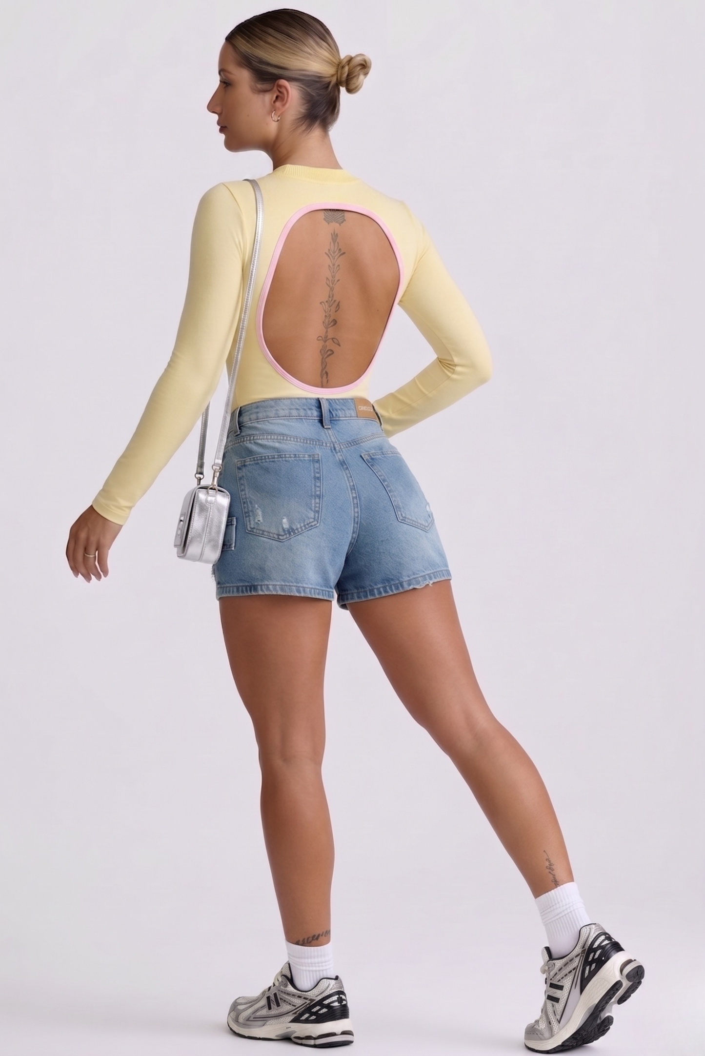 Body Manga Larga Color Amarillo y Sesgo Rosado